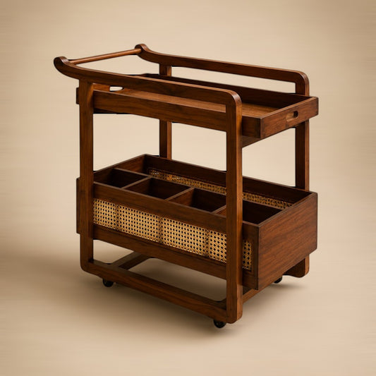 My Store two-tier teak bar cart with curved handles, cane-woven bottle compartments, and castor wheels.